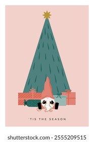 Cute Christmas gnome playing with a light chain in front of a Christmas tree and presents