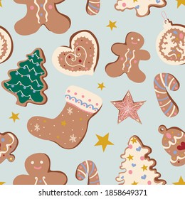 Cute Christmas pattern with gingerbread man, firs, stocking, candy cane, star, bell and heart cookies on icy blue background. Winter holidays, sweet, for kids, treats, new year, Christmas market