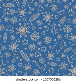 Cute Christmas pattern with the image of snowflakes, stars, comets, crackers, hearts, Christmas candy canes. Seamless vector with beige contours of the elements on a blue background