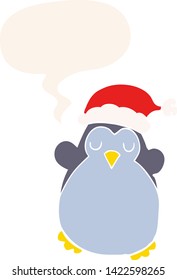 cute christmas penguin with speech bubble in retro style