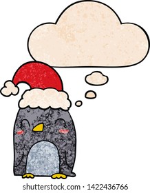 cute christmas penguin with thought bubble in grunge texture style