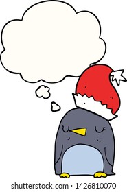 pingüino de navidad lindo con burbuja de pensamiento