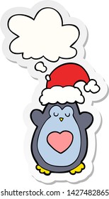 pingüino de navidad lindo con burbuja de pensamiento como pegatina impresa