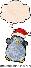 pingüino de navidad adorable con burbuja de pensamiento al estilo de textura gruesa
