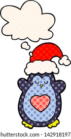 süße Weihnachtspinguine mit Gedankenblase im Comicstil