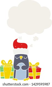 cute christmas penguin with thought bubble in retro style