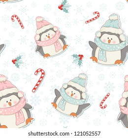 Cute Christmas penguins seamless pattern with candy canes, holly plants and snowflakes