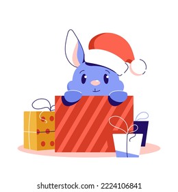 Cute christmas rabbit in santa hat sitting in gift box. Cartoon bunny. Merry Christmas and Happy New Year greeting card. Vector illustration isolated on white background.