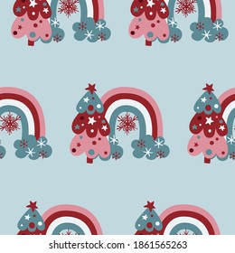 Cute christmas rainbows and pine trees seamless pattern on light bue background. Hand drawn flat vector illustration.