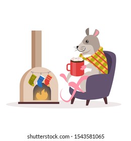 Cute Christmas rat. Animal character holding festive stuff. 2020 year symbol sitting in cozy armchair and holding a big cup of cocoa. Sitting by a fireplace. Isolated vector illustration in flat style