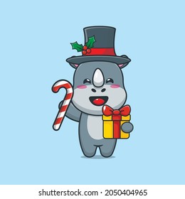 Cute christmas rhino cartoon vector illustration