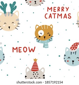 Cute Christmas seamless pattern with cute hand drawn colorful cats and lettering. Merry catmas vector illustration.