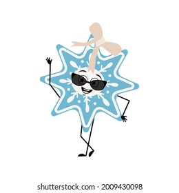 Cute Christmas snowflake with glasses and joyful emotions, smile eyes, arms and legs. Happy New Year festive decoration for holiday