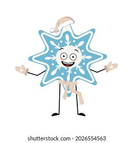 Cute Christmas snowflake with joyful emotions, smile face, happy eyes, arms and legs. Happy holiday symbol in a red Santa hat, scarf and mittens
