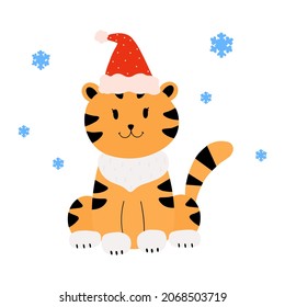 Cute Christmas Tiger Cub In A Red Cap With Snowflakes. Vector Illustration. Cartoon Style