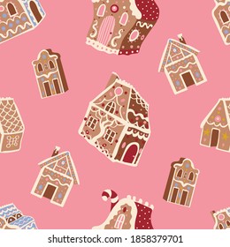 Cute Christmas vector seamless pattern with gingerbread houses on pastel pink background. Winter holidays, sweet, for kids, festive, Christmas treats, cookies, new year.
