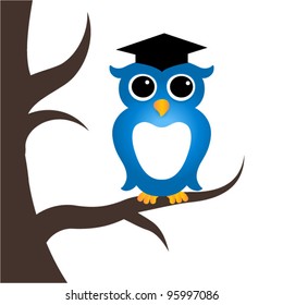 Cute and clever owl on a tree