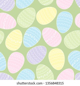 Cute colored Easter eggs on green background. Pastel colors. Vector seamless pattern.