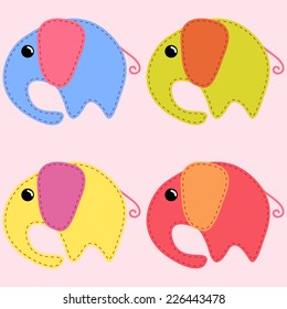 Cute colored handmade elephants over light pink background