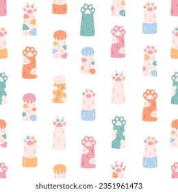 Cute colorful cats paws seamless pattern. Different funny pet paws with claws, animals hands. Vector illustration in flat style