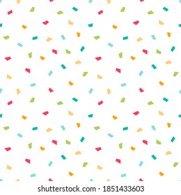 Cute colorful confetti, sprinkles vector seamless pattern background.
