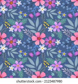 Cute colorful flowers and leaf on dark blue color background seamless pattern.