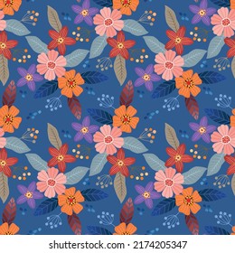 Cute colorful flowers on blue color seamless pattern. Can be used for fabric  textile  wallpaper.