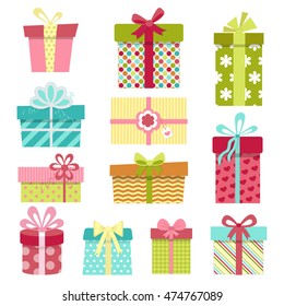 Cute colorful gift boxes set with different pattern ornaments. Birthday or Christmas presents. Isolated on white background. Vector illustration in cartoon style