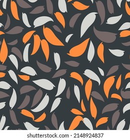 Cute colorful seamless pattern. Coffee, orange, gray abstract shapes stylized as brush strokes are randomly arranged on a dark background. Vector.
