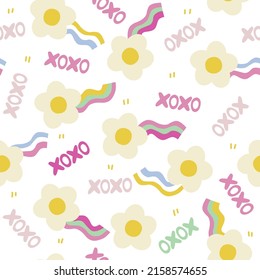Cute colorful seamless pattern with flowers and rainbows. Childish print. Vector hand drawn illustration.