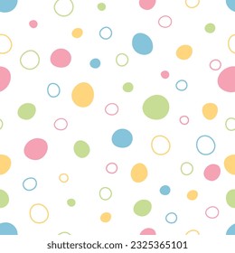 Patrón transparente y colorido con puntos para ilusiones infantiles.círculos multicolores sobre un fondo blanco para tela, impresiones