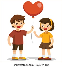 Cute couple, A boy holds a red heart-shaped balloon and he give to a girl on Valentine's Day