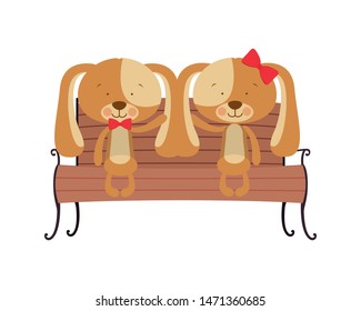 cute couple of dogs sitting on park chair