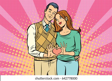 Cute couple, hand gesture a heart of love. Pop art retro vector illustration drawing
