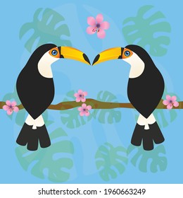 A cute couple of toco toucans sitting together on a branch. Their beaks touch. In the background are monstera leafs and pink blossom flowers. Tropical picture.