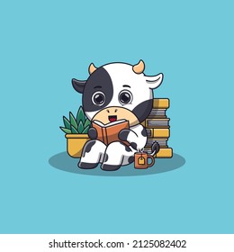 cute cow sitting while reading book
