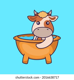 Cute cow taking a bath in the bathtub.