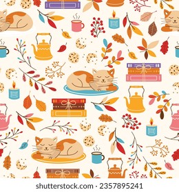 Cute cozy seamless pattern with sleepy cat, books, tea kettle, mug and colorful fall leaves. Vector illustration.