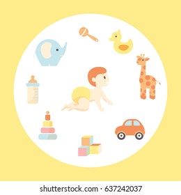 Cute crawling baby with toys around.