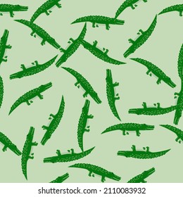 Cute crocodiles seamless pattern.Funny animals background. Repeated texture in doodle style for fabric, wrapping paper, wallpaper, tissue. Vector illustration.