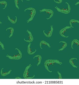 Cute crocodiles seamless pattern.Funny animals background. Repeated texture in doodle style for fabric, wrapping paper, wallpaper, tissue. Vector illustration.