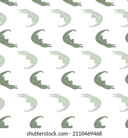Cute crocodiles seamless pattern.Funny animals background. Repeated texture in doodle style for fabric, wrapping paper, wallpaper, tissue. Vector illustration.