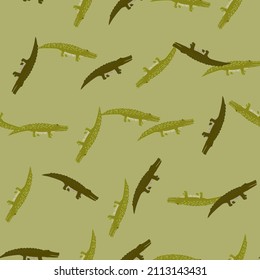 Cute crocodiles seamless pattern.Funny animals background. Repeated texture in doodle style for fabric, wrapping paper, wallpaper, tissue. Vector illustration.