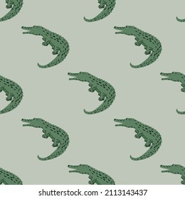 Cute crocodiles seamless pattern.Funny animals background. Repeated texture in doodle style for fabric, wrapping paper, wallpaper, tissue. Vector illustration.