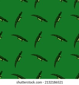 Cute crocodiles seamless pattern.Funny animals background. Repeated texture in doodle style for fabric, wrapping paper, wallpaper, tissue. Vector illustration.