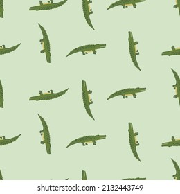 Cute crocodiles seamless pattern.Funny animals background. Repeated texture in doodle style for fabric, wrapping paper, wallpaper, tissue. Vector illustration.