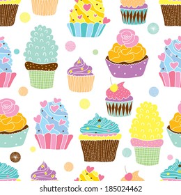 Cute cupcakes. Vector seamless pattern.