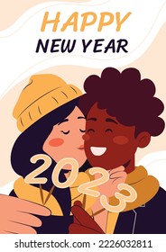 Cute cuple celebtrating new year with a kiss, holding numbers over white and yellow background 