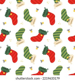 Cute decorated christmas socks, christmas stocking, sock-shaped bags vector seamless pattern background for winter holidays design.
