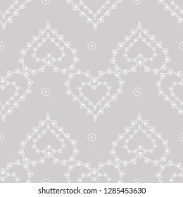 Cute delicate abstract seamless pattern of lace hearts